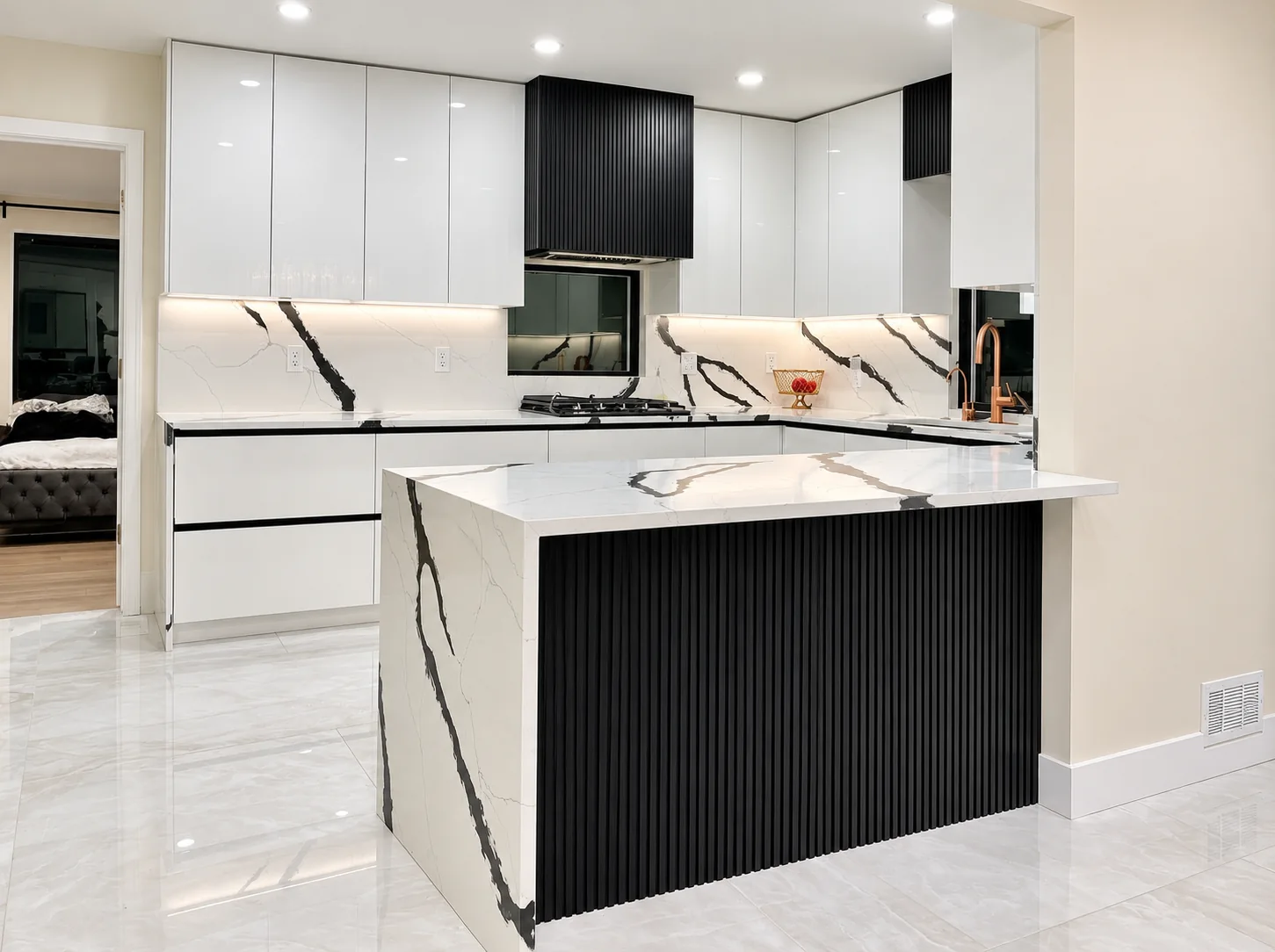 Completed white kitchen with black fluted millwork